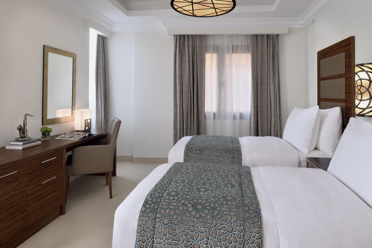 Marriott Executive Apartments Эль-Хубар Экстерьер фото A guest room at the hotel