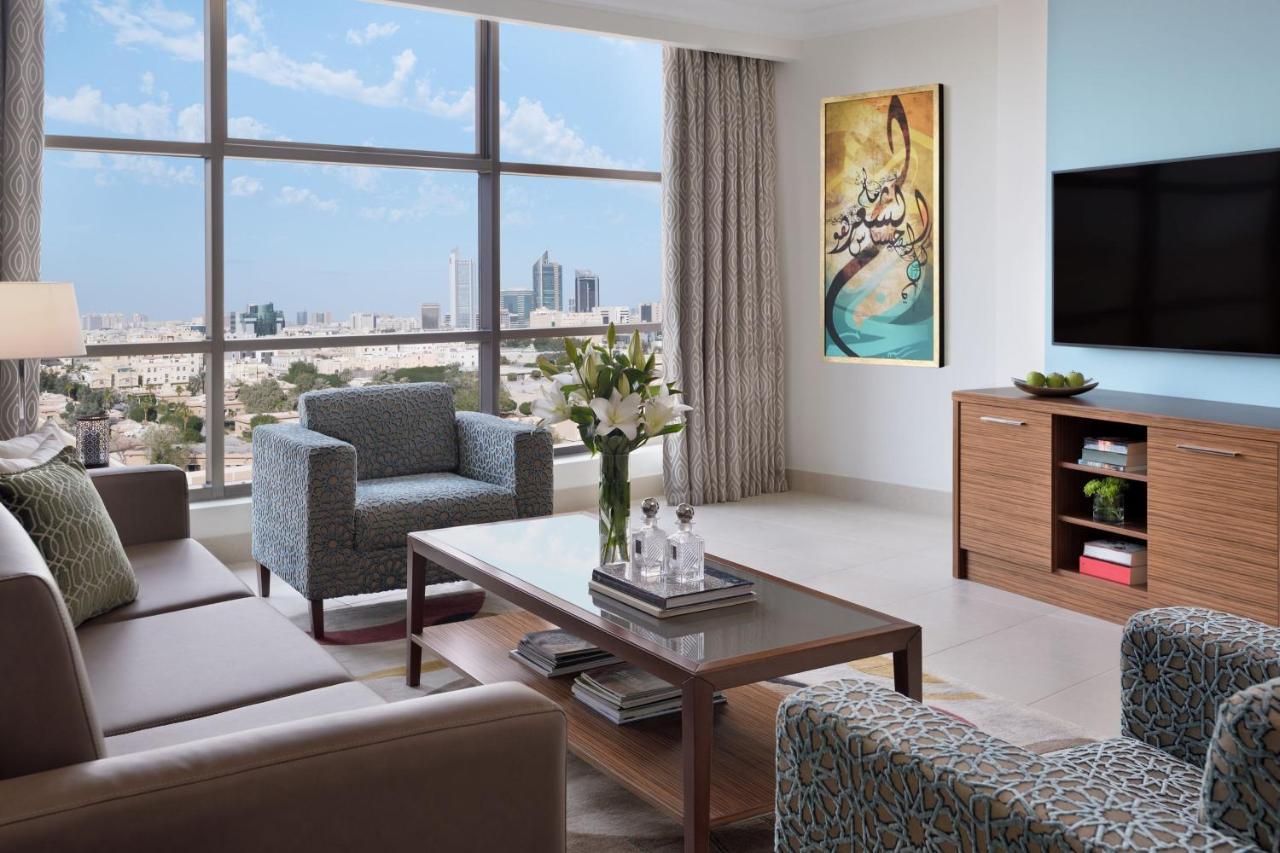 Marriott Executive Apartments Эль-Хубар Экстерьер фото A living room in a typical apartment
